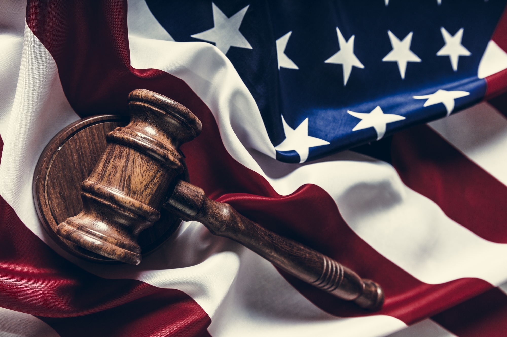 Wooden gavel and USA flag